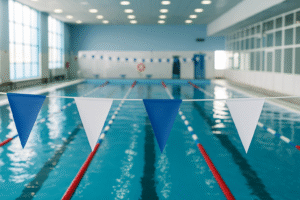 Indoor swimming pool with clean lanes and safety flags
